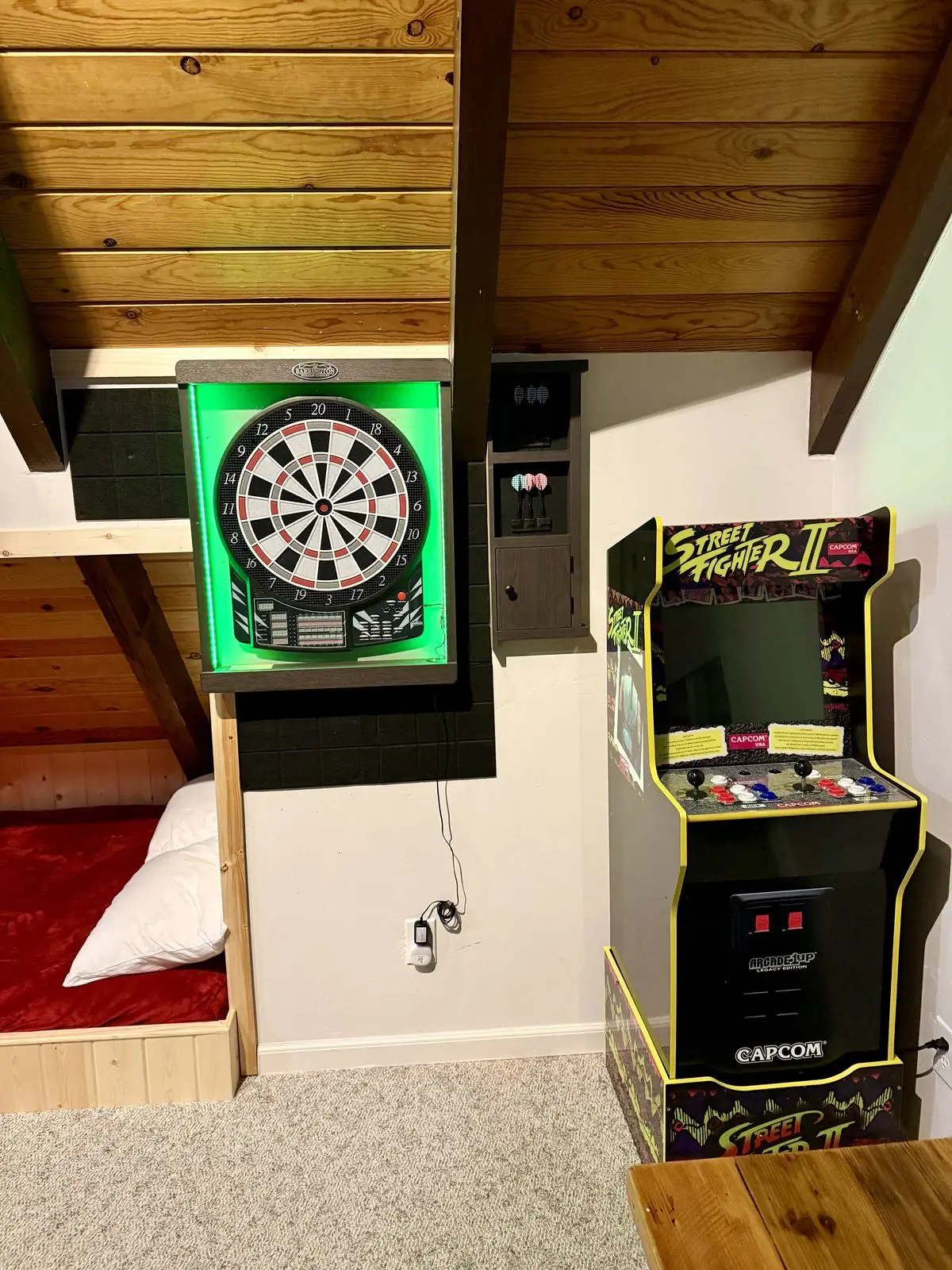 Electronic dartboard and Street Fighter II arcade cabinet