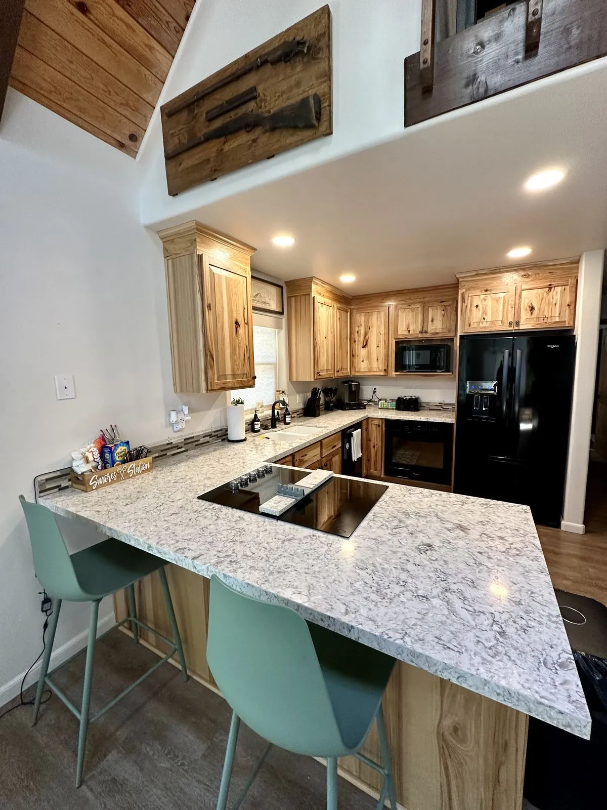 Kitchen counter with cooktop and smores station
