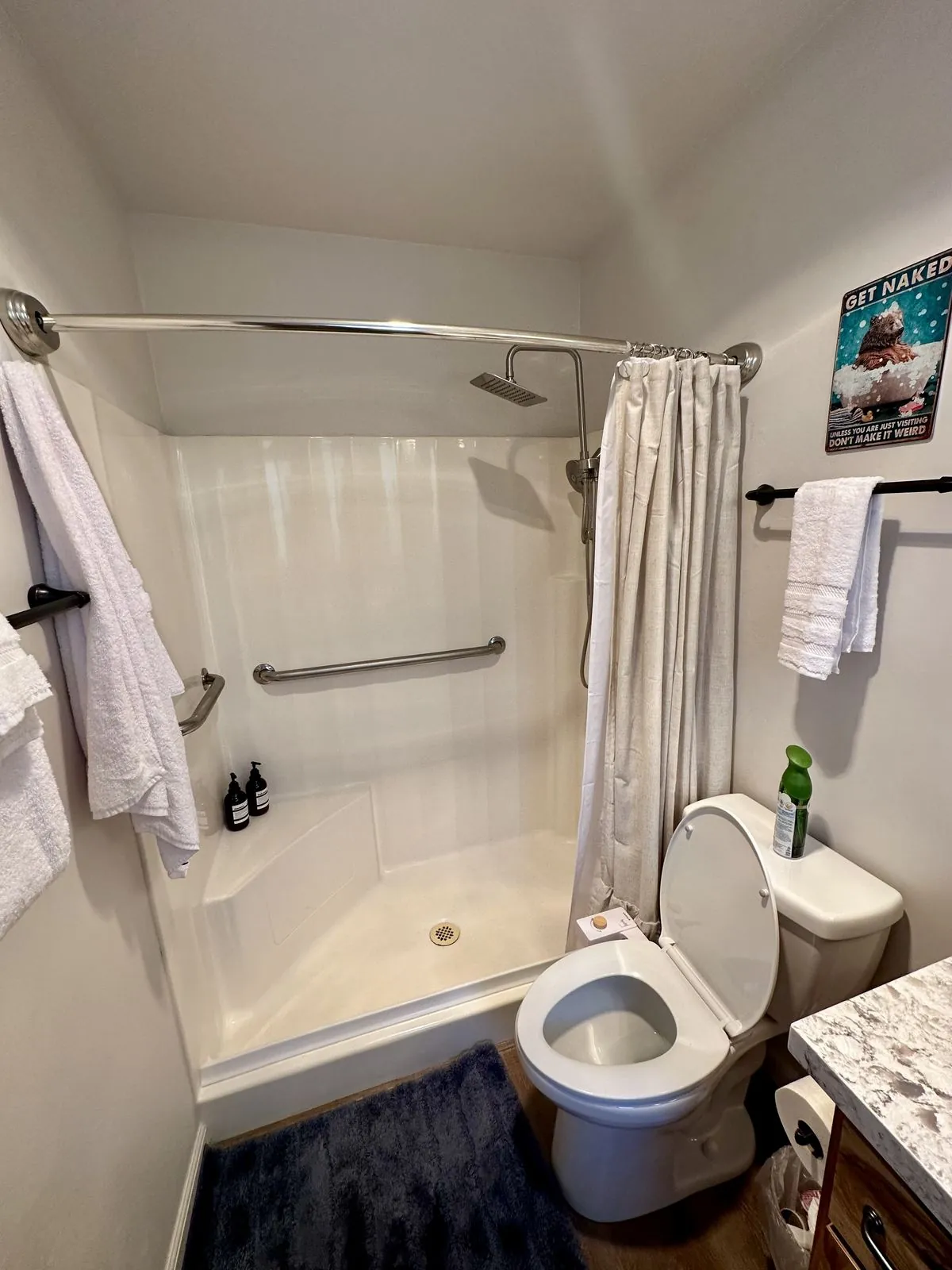 Primary bathroom walk-in shower with rain shower head
