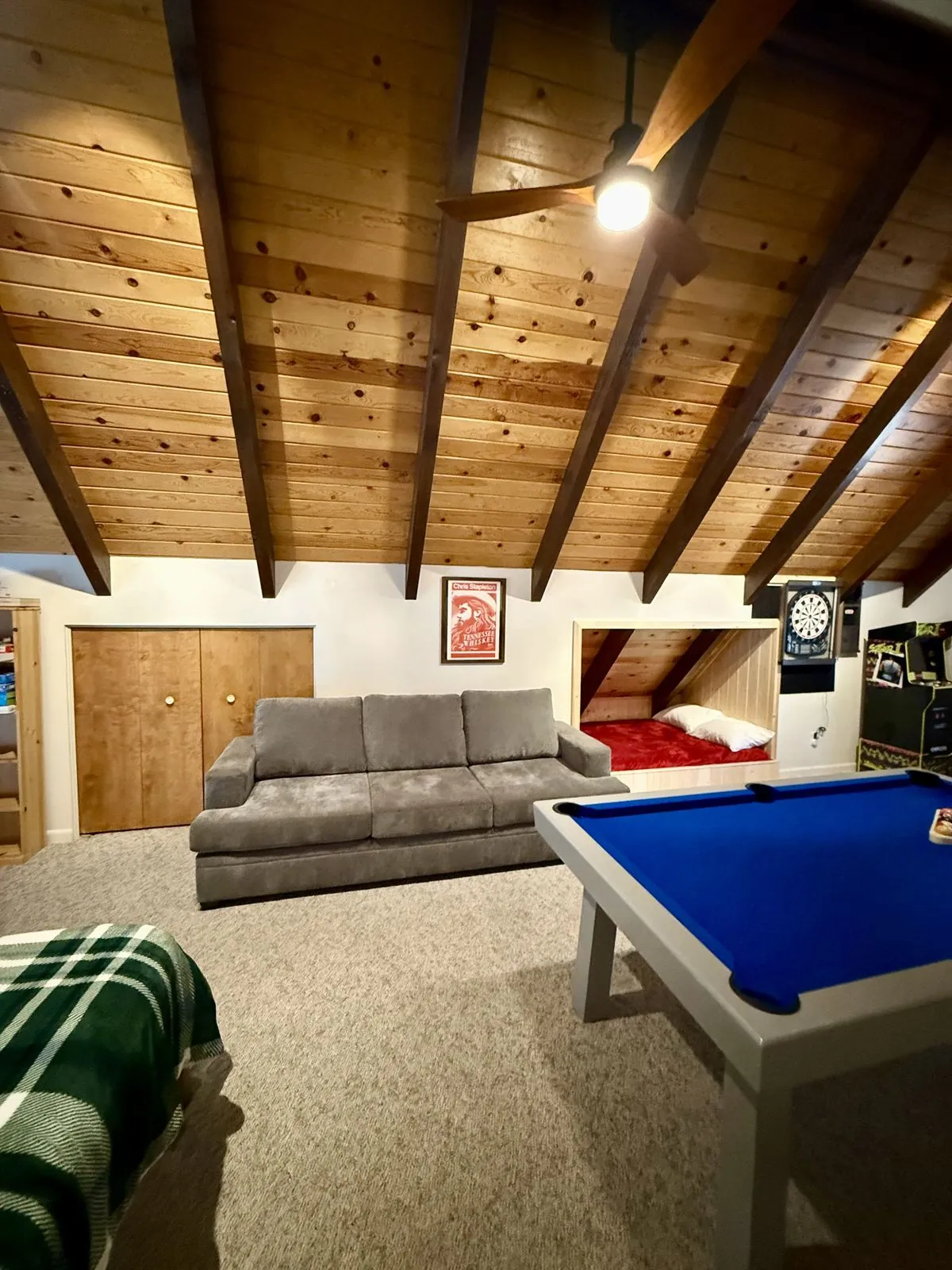 Sofa seating with closet storage and bed nook
